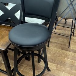 Two Black Swivel Barstools
