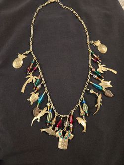 Rare Vintage Lucy Isaacs Sterling Silver "Rainforest" charm necklace.