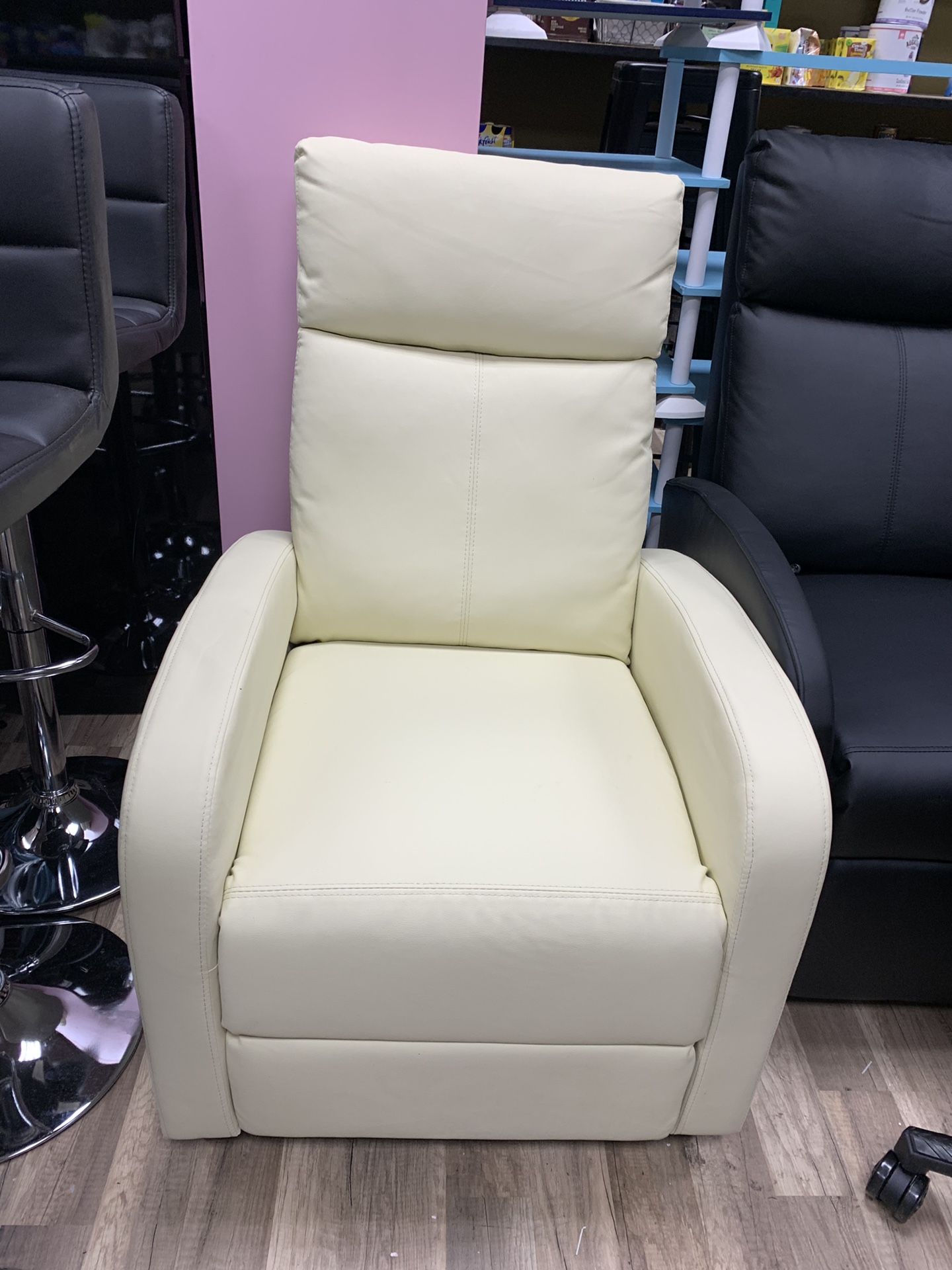 Cream leather recliner