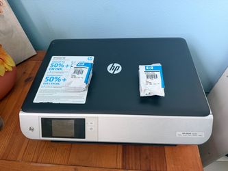 HP ENVY 5530 e-All-in-One Printer with its ink
