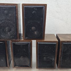 6 unbranded brown satellite or garage speakers made in Taiwan