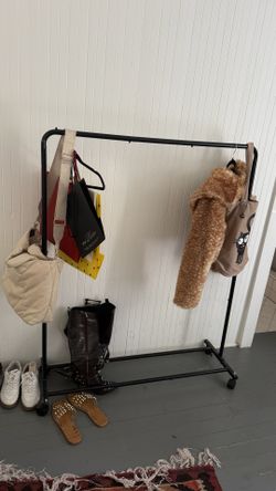 Wardrobe stand black on castors