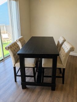 black dining table with chairs