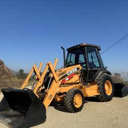 Case 570mxt Enclosed Cab Skip Loader 