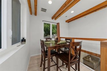 Brown dining table and chairs