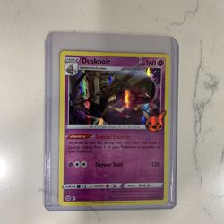 Dusknoir Pokémon card in sleeve
