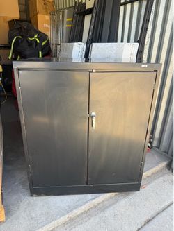 Black metal cabinet 🗄️
