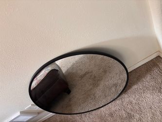 Round black mirror