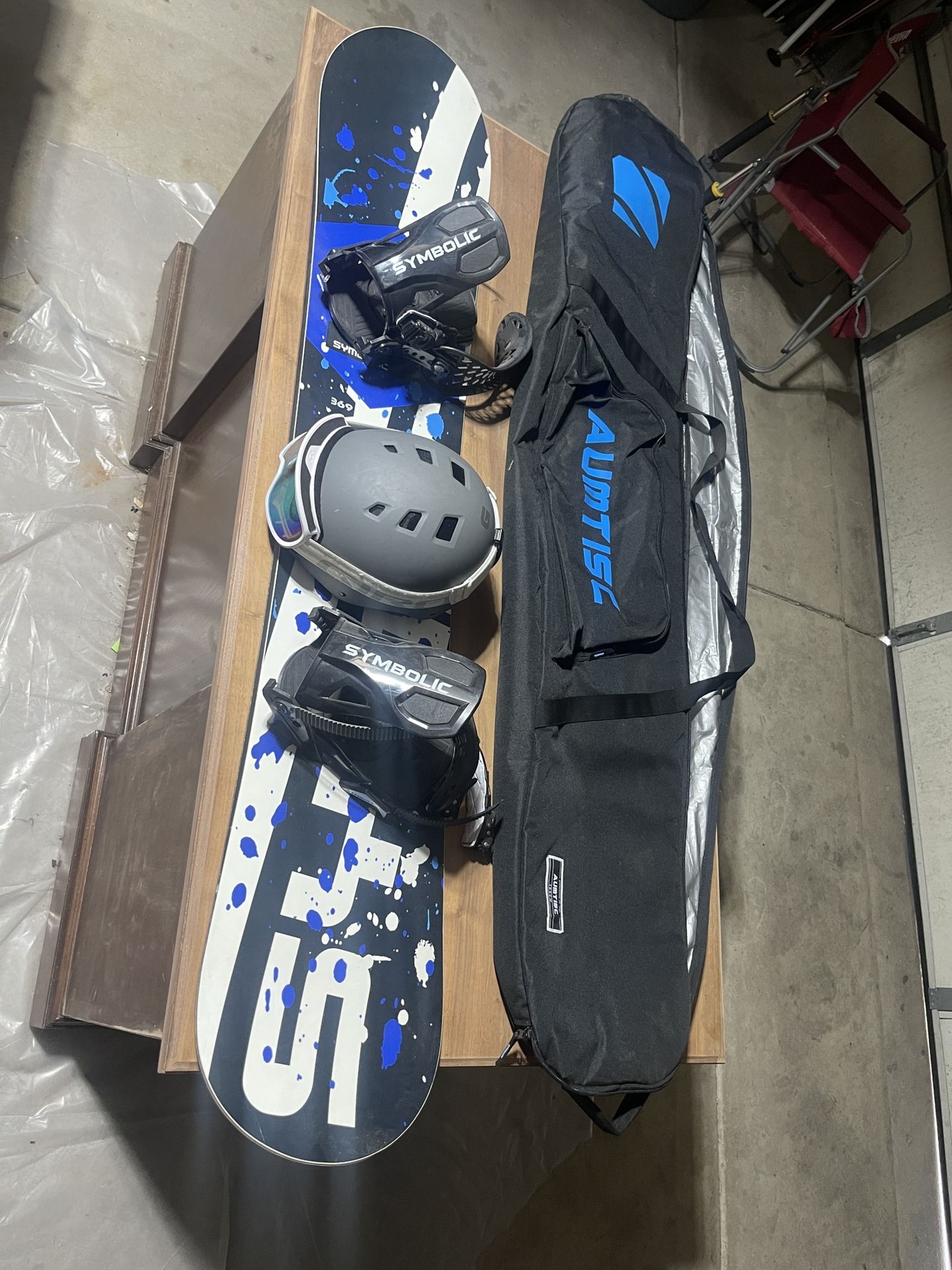 Symbolic Snowboard, With Helmet, Goggles, And Bag