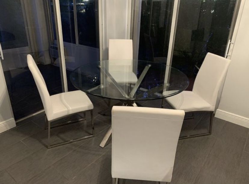 Round Glass Table with chrome base and 4 chairs
