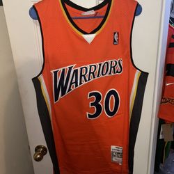 Size xl Stephen Curry orange NBA jersey Mitchell and ness