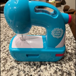 girl’s sewing machine