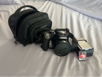Nikon CoolPix P80 with battery, charger, memory card and carrying case