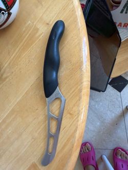 Cutco cheese knife with comfort grip