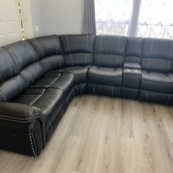 New 3 Reclining Power Sectional.  Black Leather.  116” X 106” X 41” H.  Free Delivery!