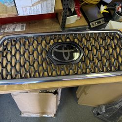 2019 to 2019 Toyota Tacoma Sport grille one broken tab as pictured