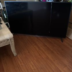 Sceptre 4K UHD Flat Screen TV 57”x34” With Roku And soundbar