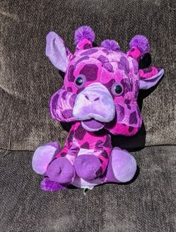 Purple giraffe stuffed toy