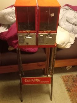 Boys Enjoy Candy And Toy Machines From The Late 50s