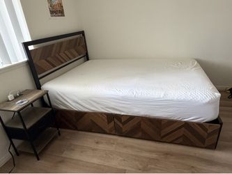 Full size bed frame with 4 storage drawers, mattress and nightstand with charging station