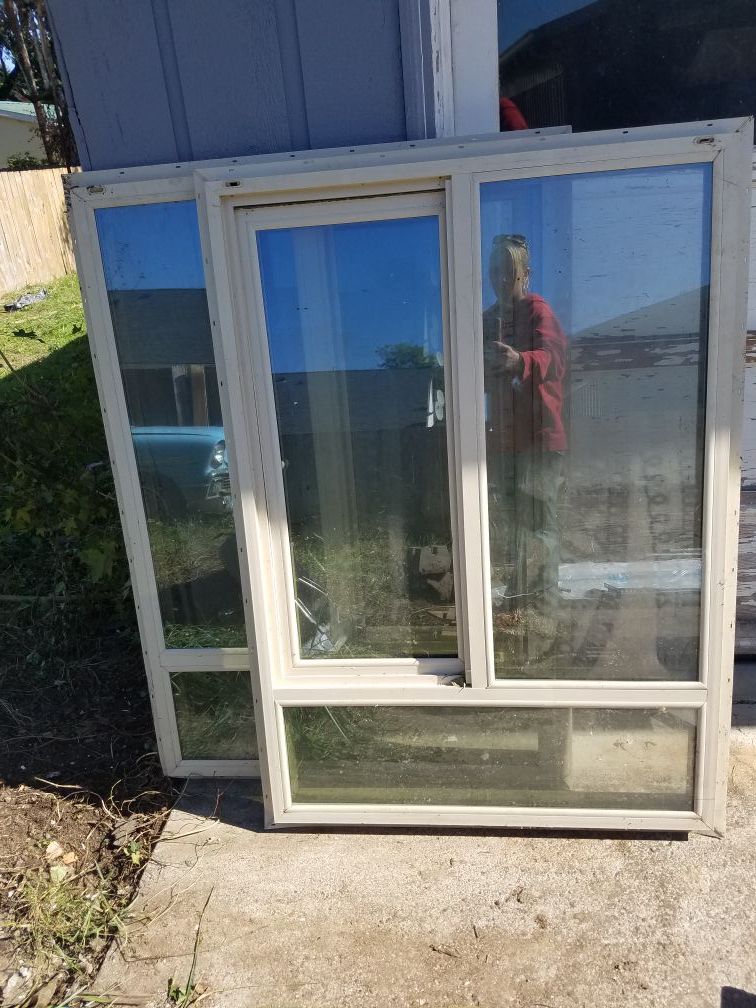 (2) 51" x 35 3/4" double pain vinyl windows