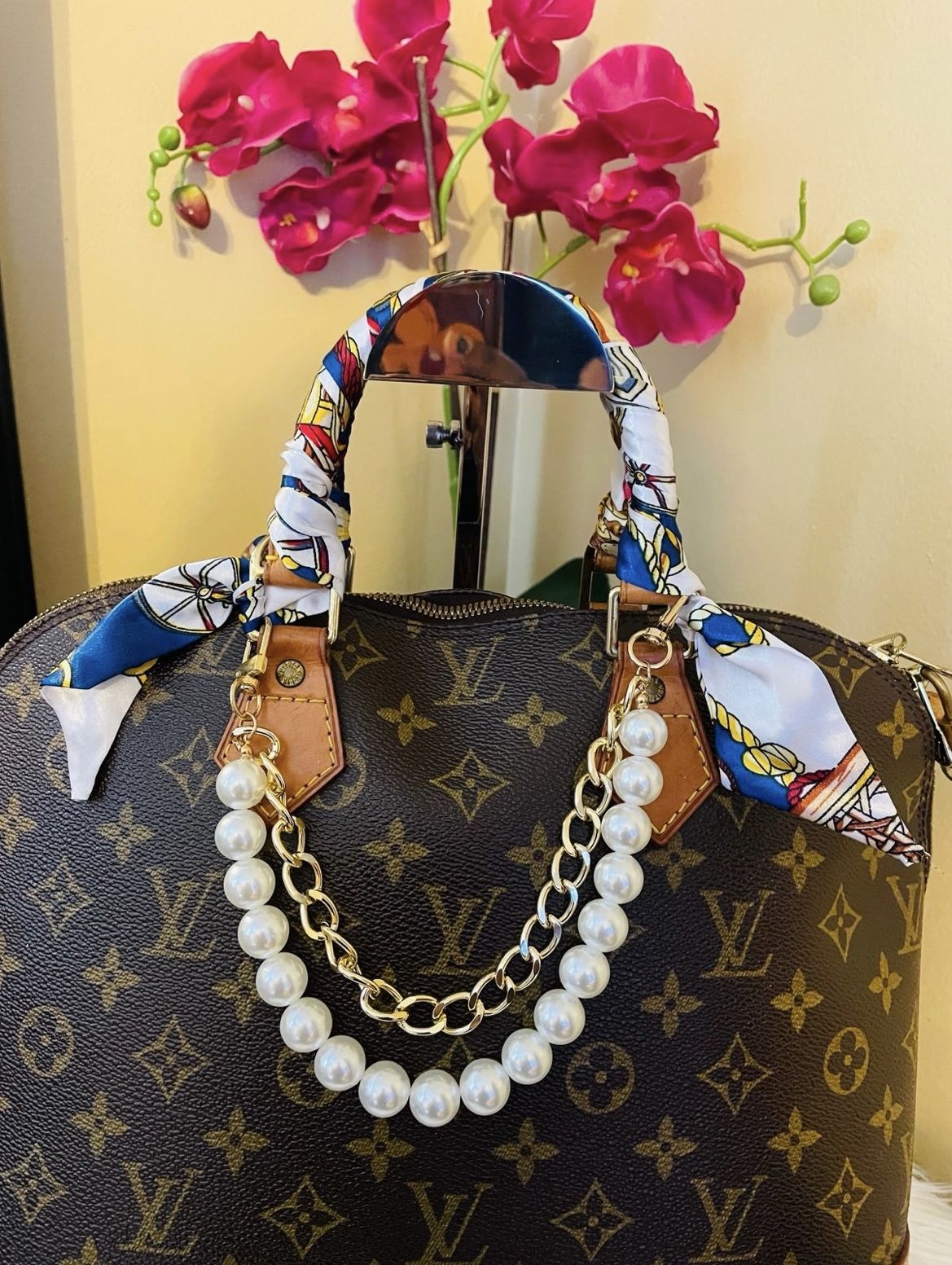 Louis Vuitton Alma Handbag