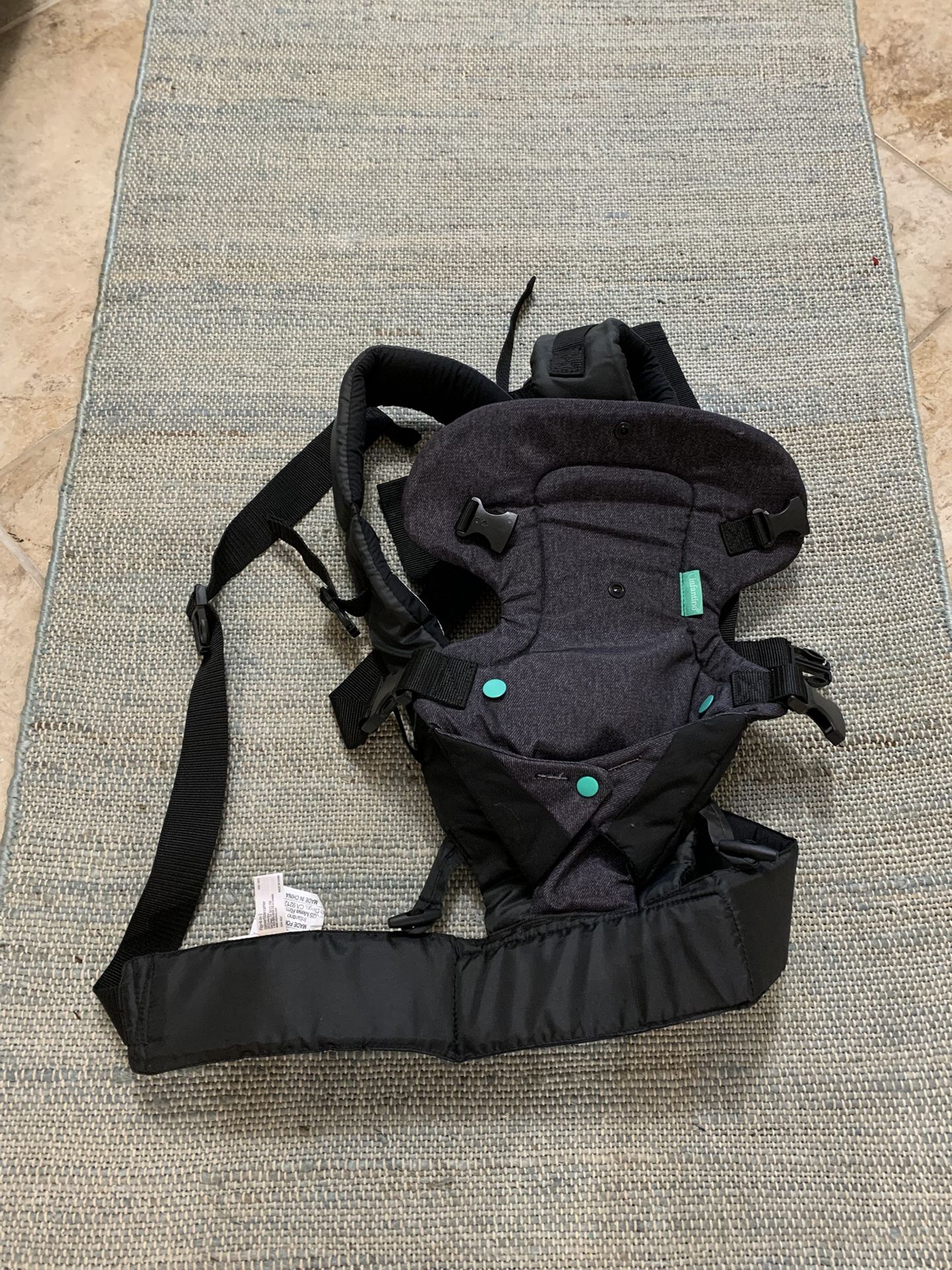 Baby carrier. Tag in picture.