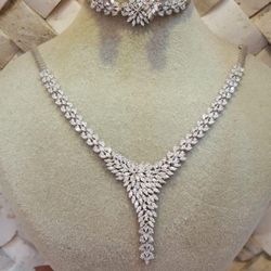 Diamond Necklace, Bracelet, and Pair of Earrings