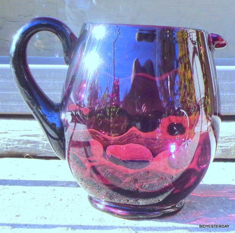 Antique reverse thumbprint hand blown amethyst glass water pitcher