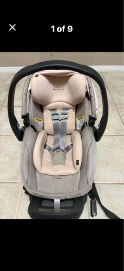 Peg Perego Primo Viaggio Nido Infant Car Seat in the "Mon Amour" pink and grey color