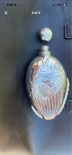 Silver plated “Drink Like a Fish” hip flask.