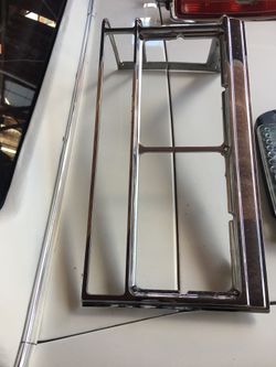 1980’s Cadillac chrome headlight bezels.