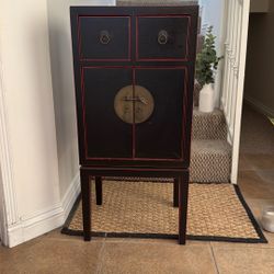 Chinese black and red lacquer cabinet