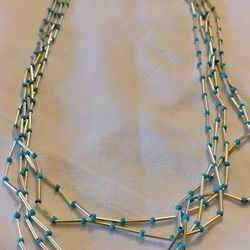 Lovely weight Native American liquid silver necklace, 24” long.