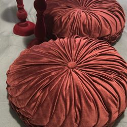 Two Pillows And To Candle Holders