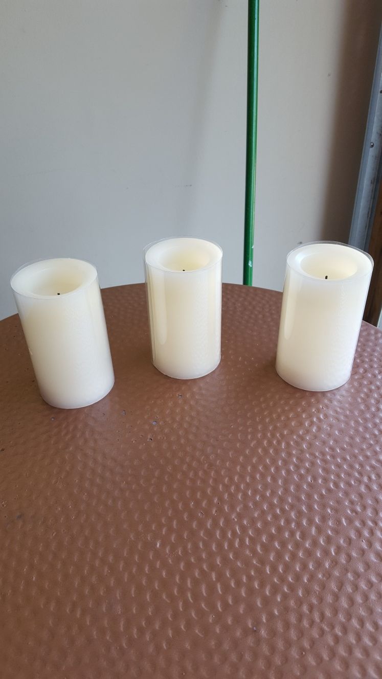 Battery operated pillar candles, each