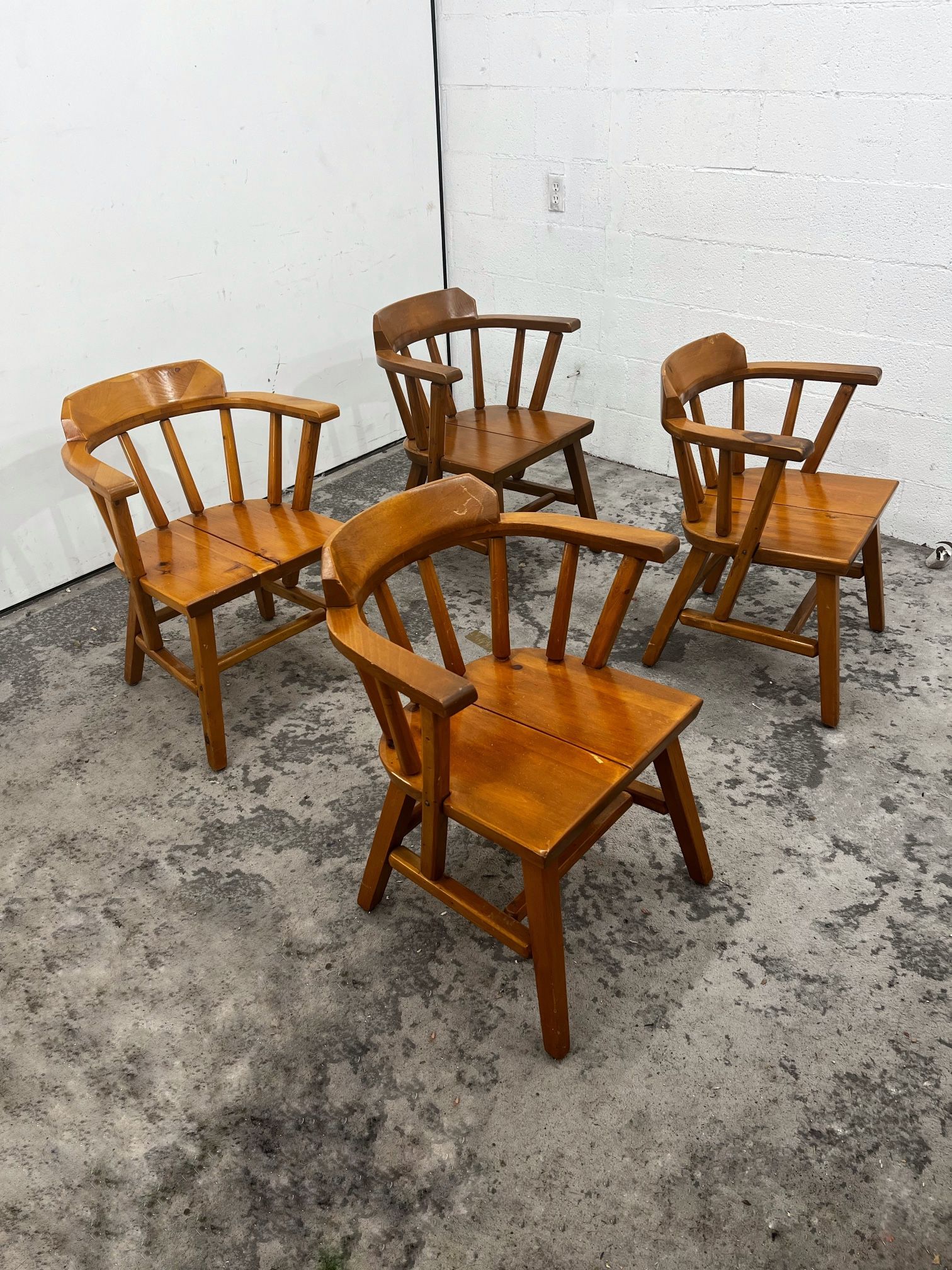 Set of vintage mid century modern arm chairs in solid knotty