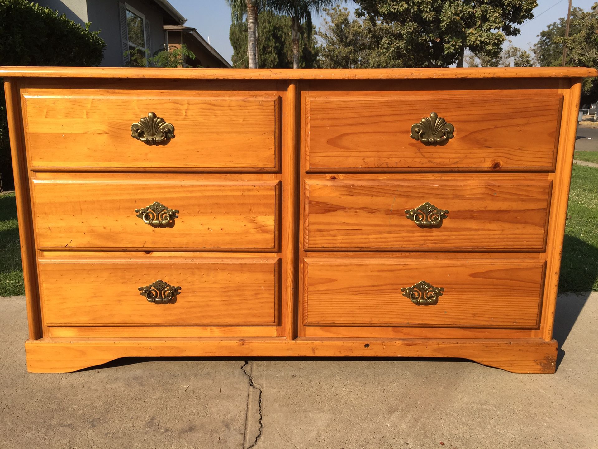 Long dresser come with six drawers in good condition all drawers open fine.