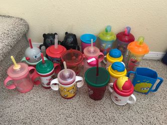 Lot of 18 Toddler Sippy Cups - Sesame Street, Dora, Disney Brave, Holiday, Snoopy plus juice box holder