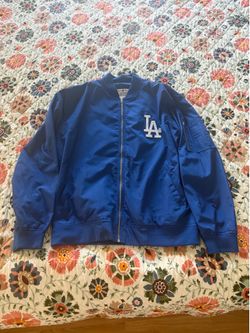 like new dodgers blue jacket with zipper on the side size XL