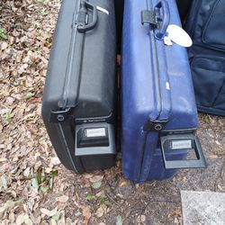 TWO PULL ALONG SUITCASES 