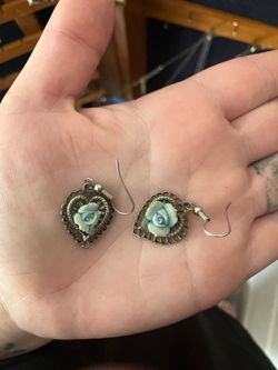 Heart shaped earrings with blue rose cameo