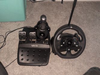 Logitech Steering Wheel and pedal setup with shifter.