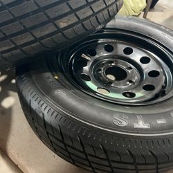 Rims And Tires For A Utility Trailer