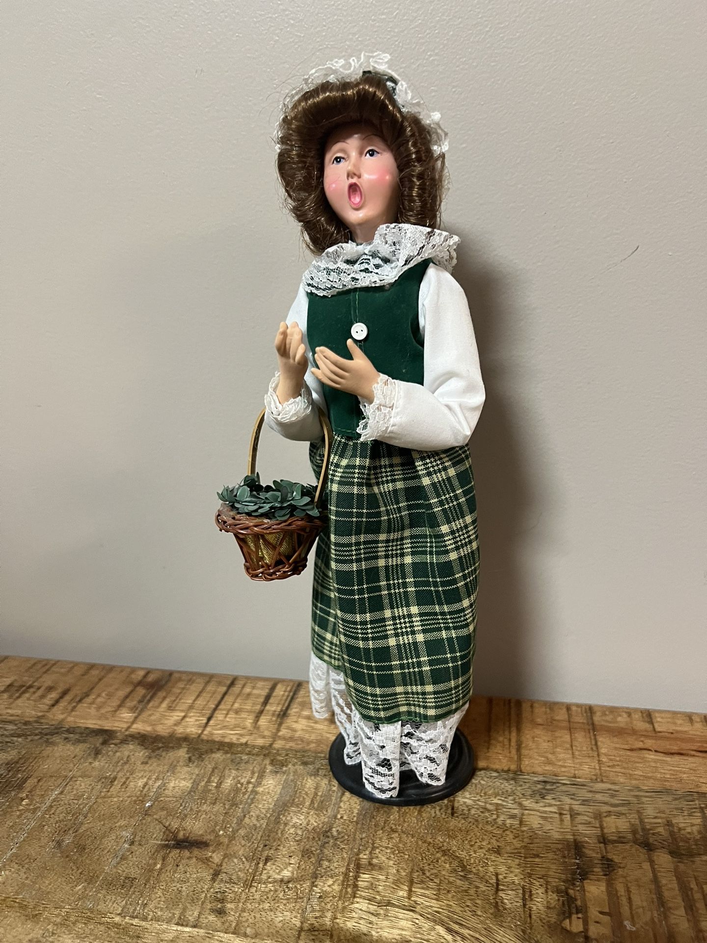 Carolers Series Collective Doll dressed in primitive green outfit