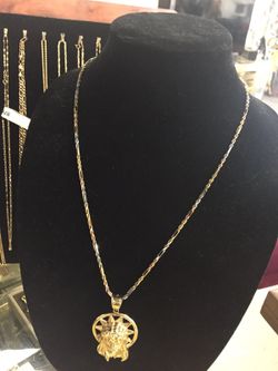 Jesus charm and chain 14kt 26 gram