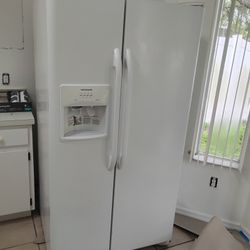 Working, White Appliances. Refrigerator, Electric Stove, Dishwasher 