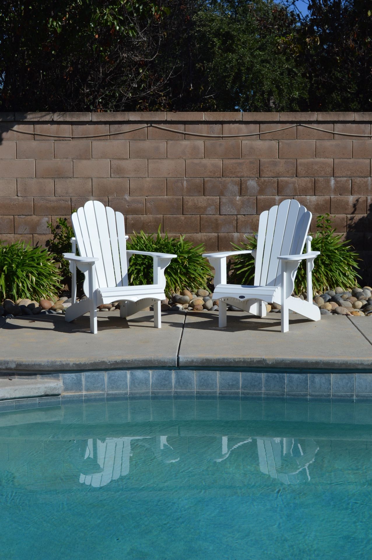 Twin White Adirondack Chairs