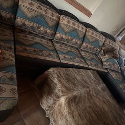 Hand crafted leather couches with cow hide ottoman