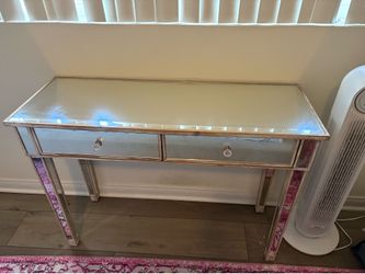 Whitewashed wood and glass vanity